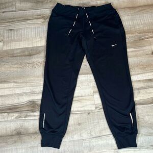 Nike Dri-Fit jigger running pants size medium